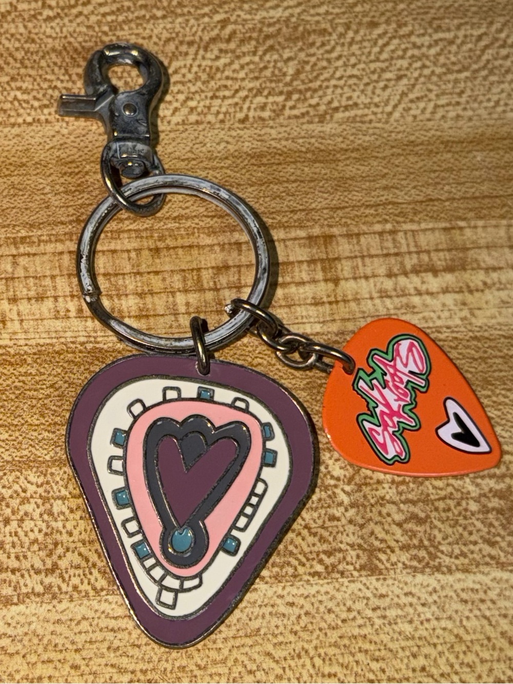 Sakroots enamel Heart Motif Guitar Pick Keychain in Purple and Pink bag charm